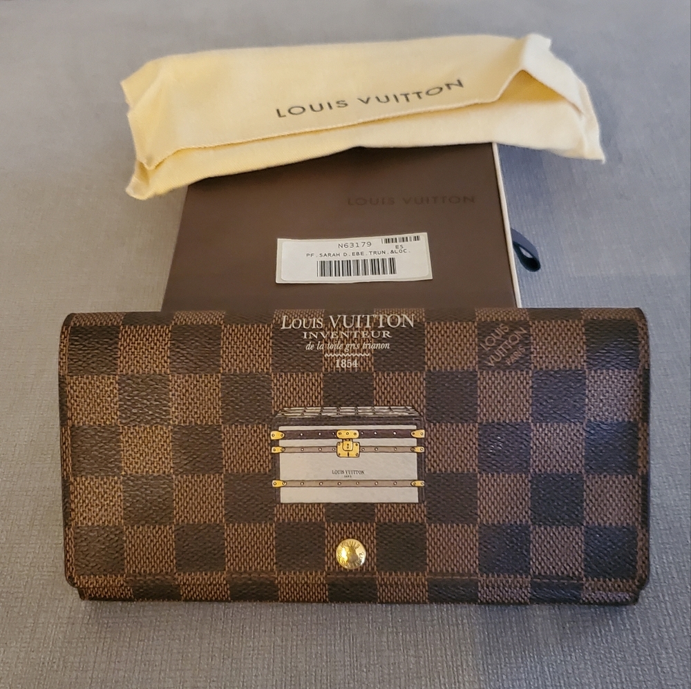 Sold. Louis Vuitton Damier Ebene Trunk & Lock Sarah Wallet- Limited Edition